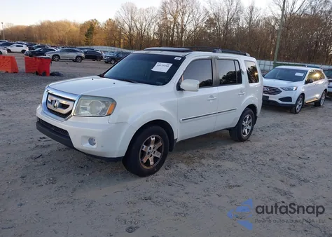 2011 Honda Pilot Touring z USA, uszkodzony, nr VIN 5FNYF3H99BB052009
